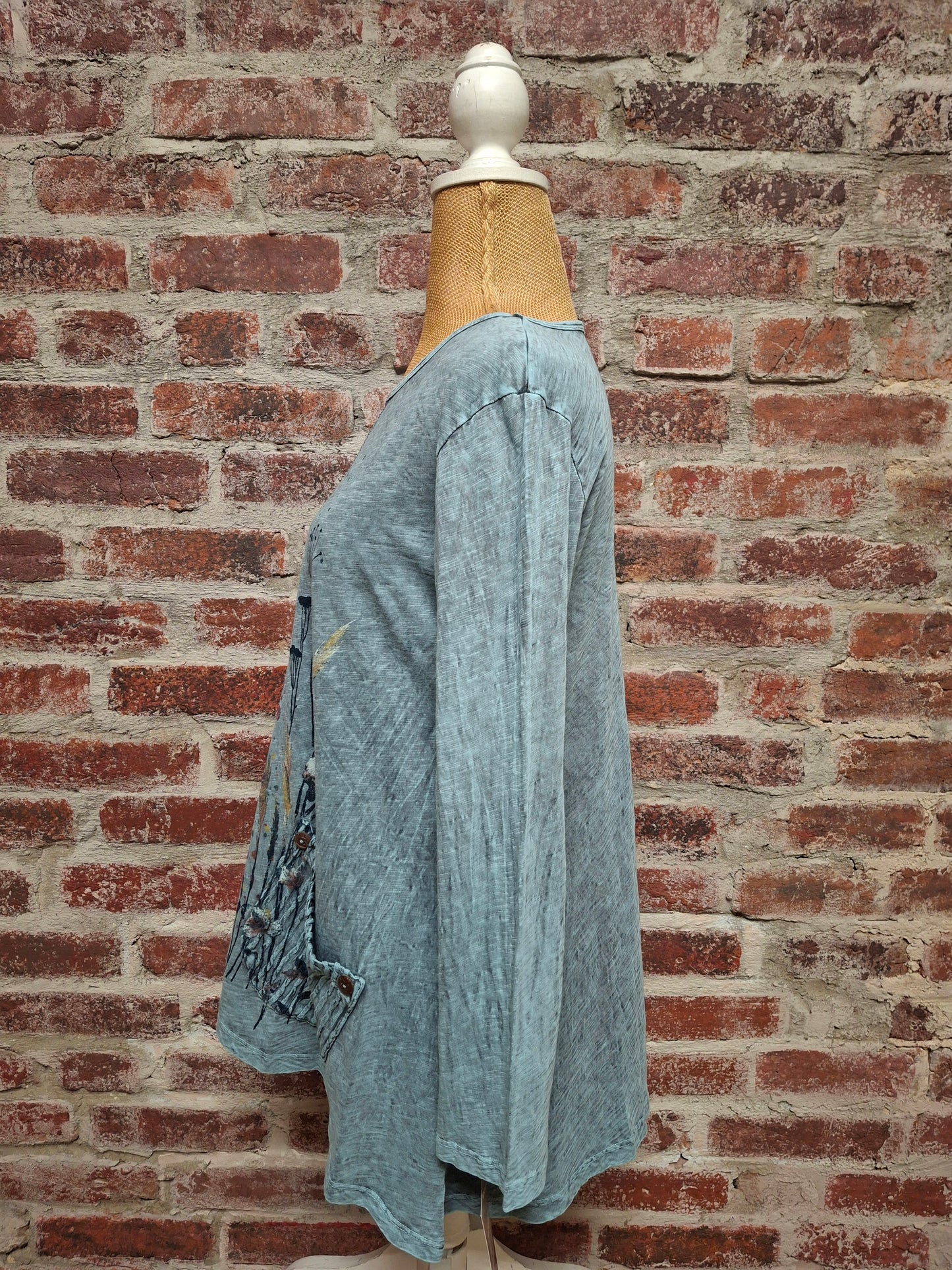 Teal Floral Front Seam Single Pocket Top